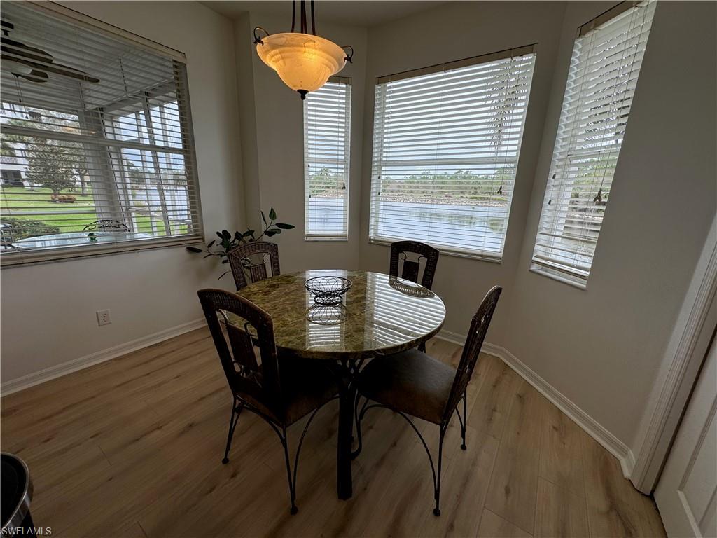 Dining room with light hardwood / wood-style floors