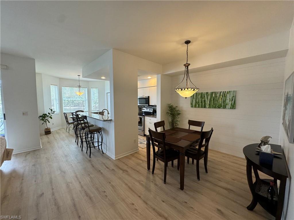 Dining space featuring light hardwood / wood-style floors