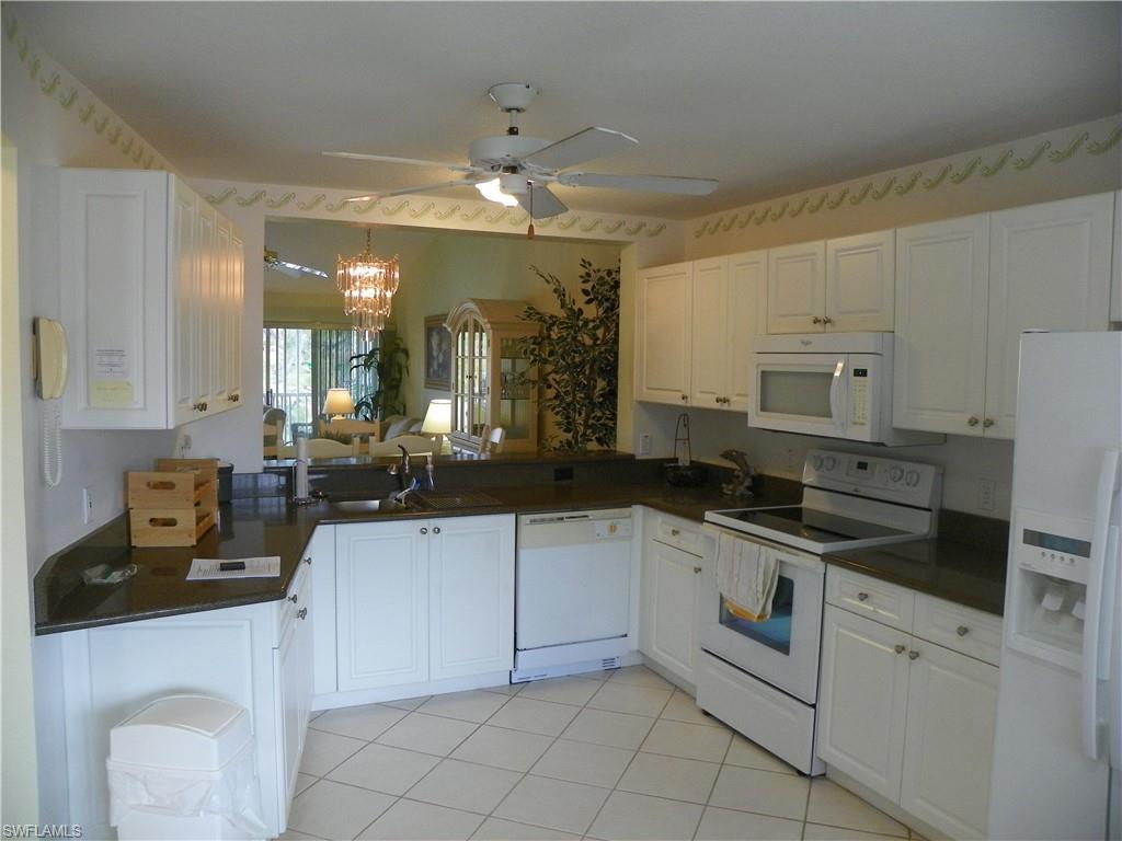 Large Kitchen with plenty of cabinet and counter space.