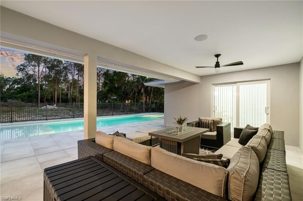 Large lanai area with outdoor fans and Bose speaker system.
