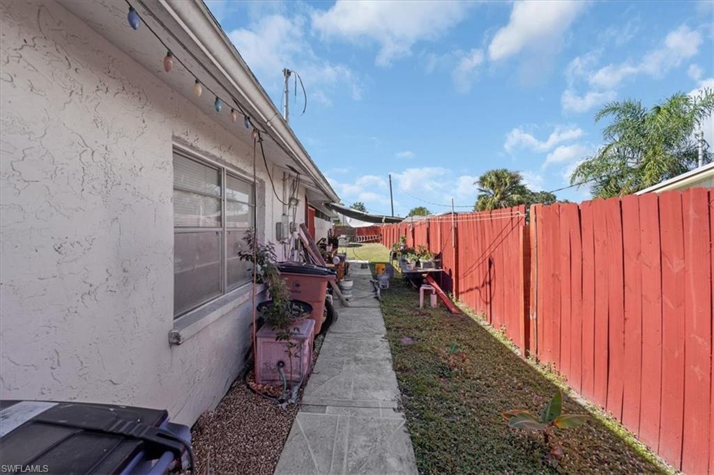 View of fenced backyard