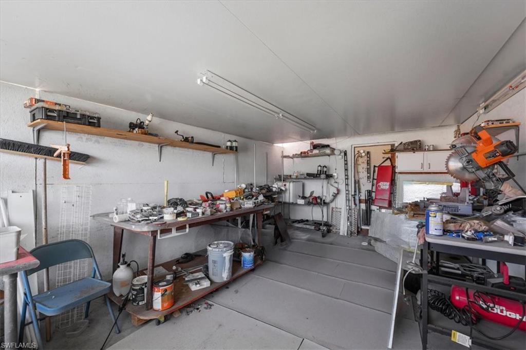 Below grade area featuring a workshop area