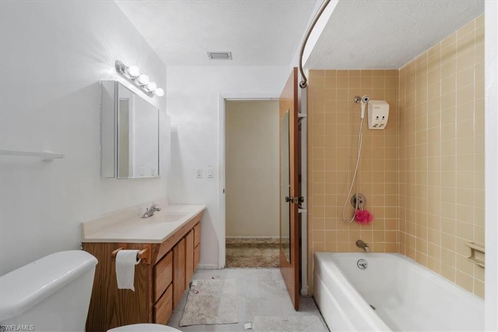 Bathroom with  shower combination and vanity