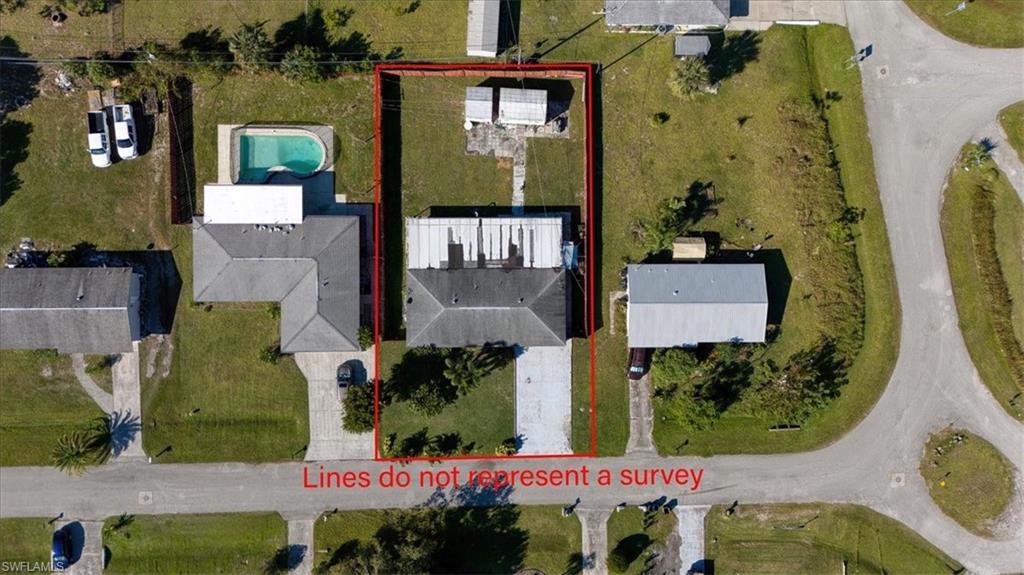 Aerial overview of property's location featuring property boundaries highlighted