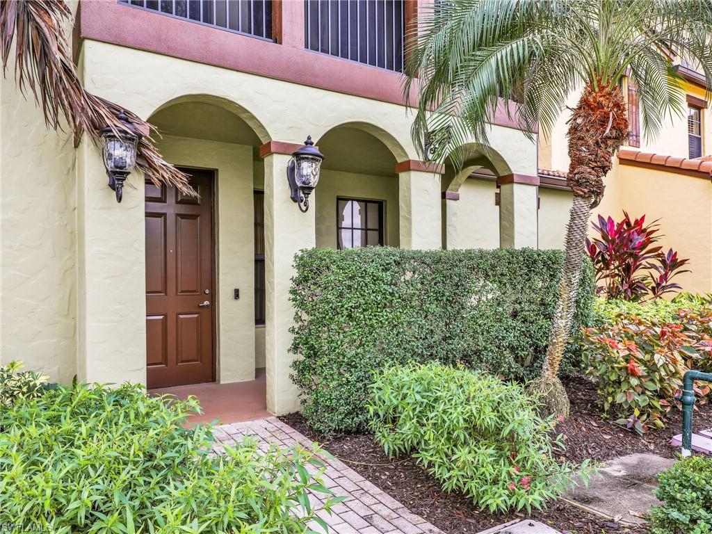 View of exterior entry with stucco siding