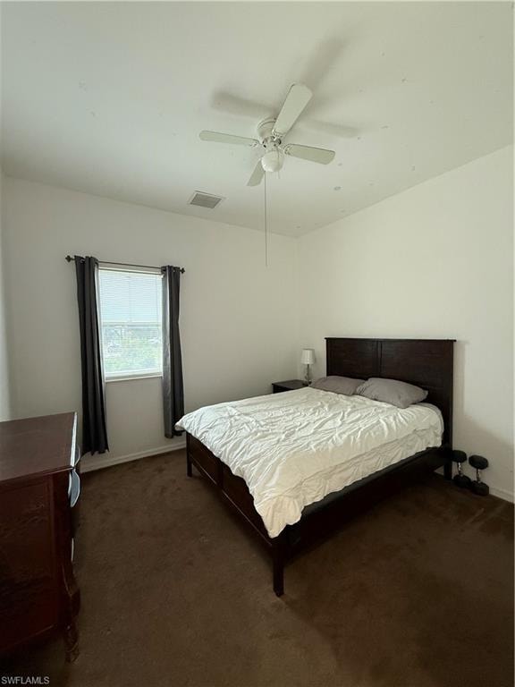 Bedroom with carpet and a ceiling fan