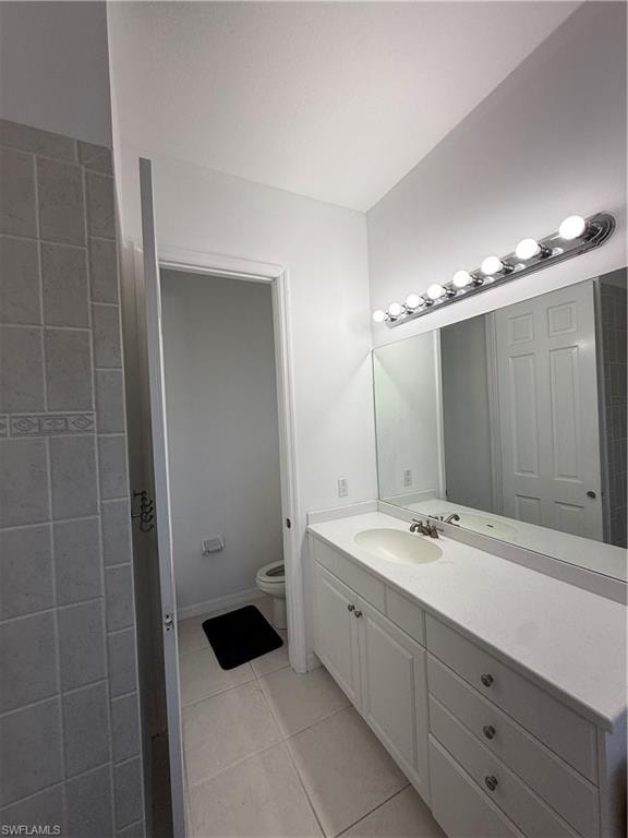 Full bathroom featuring vanity and light tile patterned floors