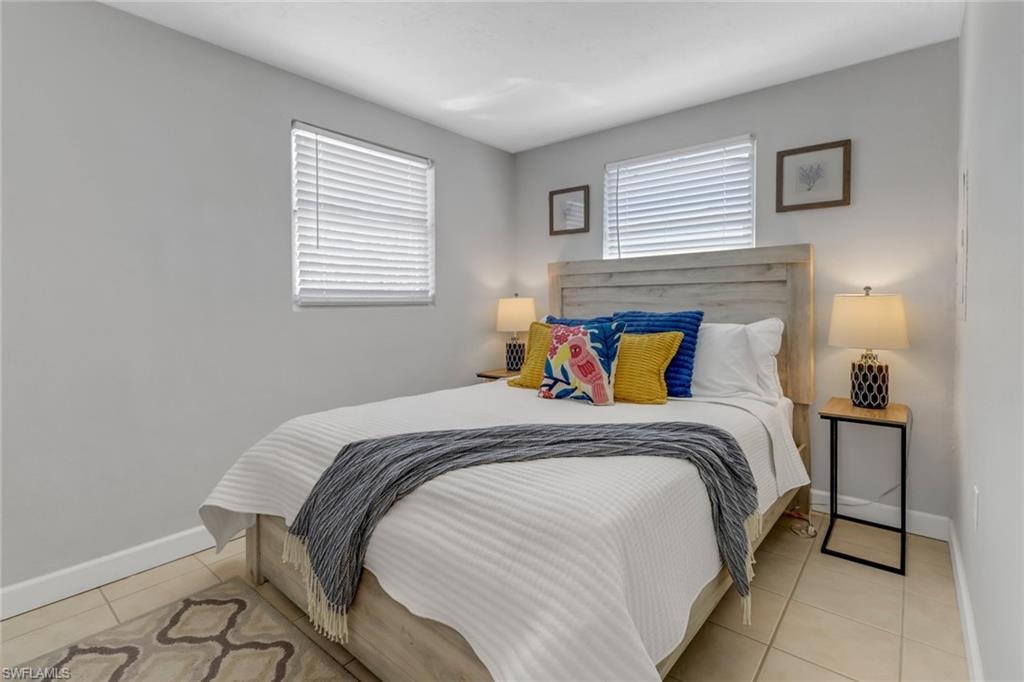 Bedroom featuring light tile patterned floors