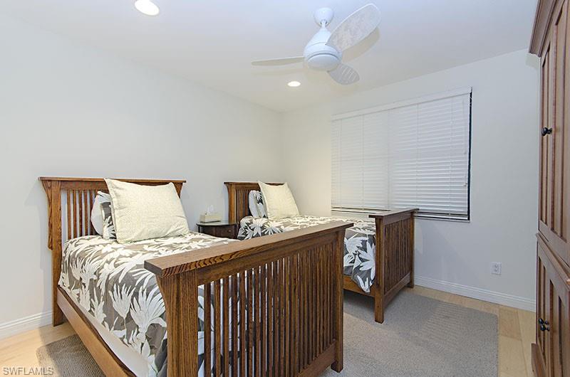 Bedroom featuring recessed lighting, light wood-style floors, and ceiling fan
