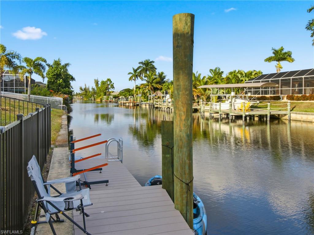 Dock featuring a water view