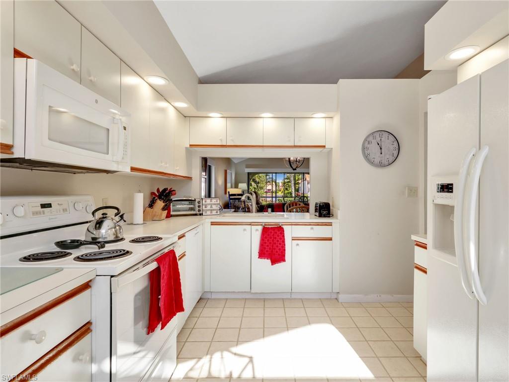 Original kitchen with view through to lake
