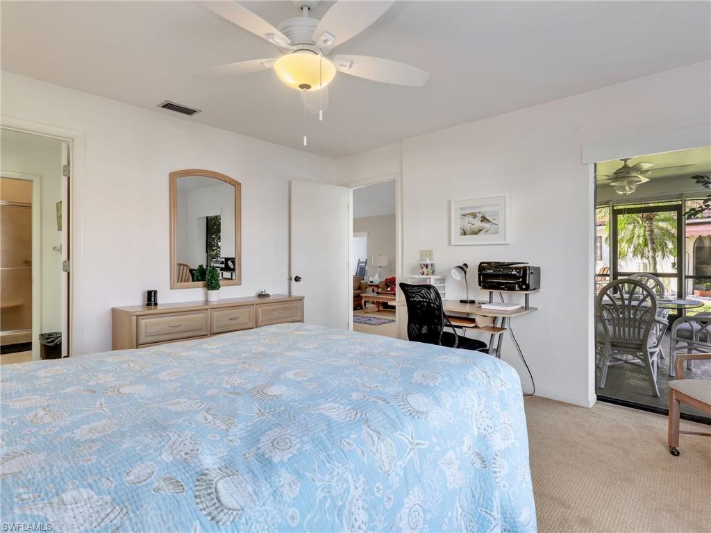 Primart bedroom with door to lanai