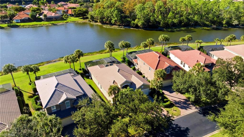 Aerial view of residential area with a large body of water