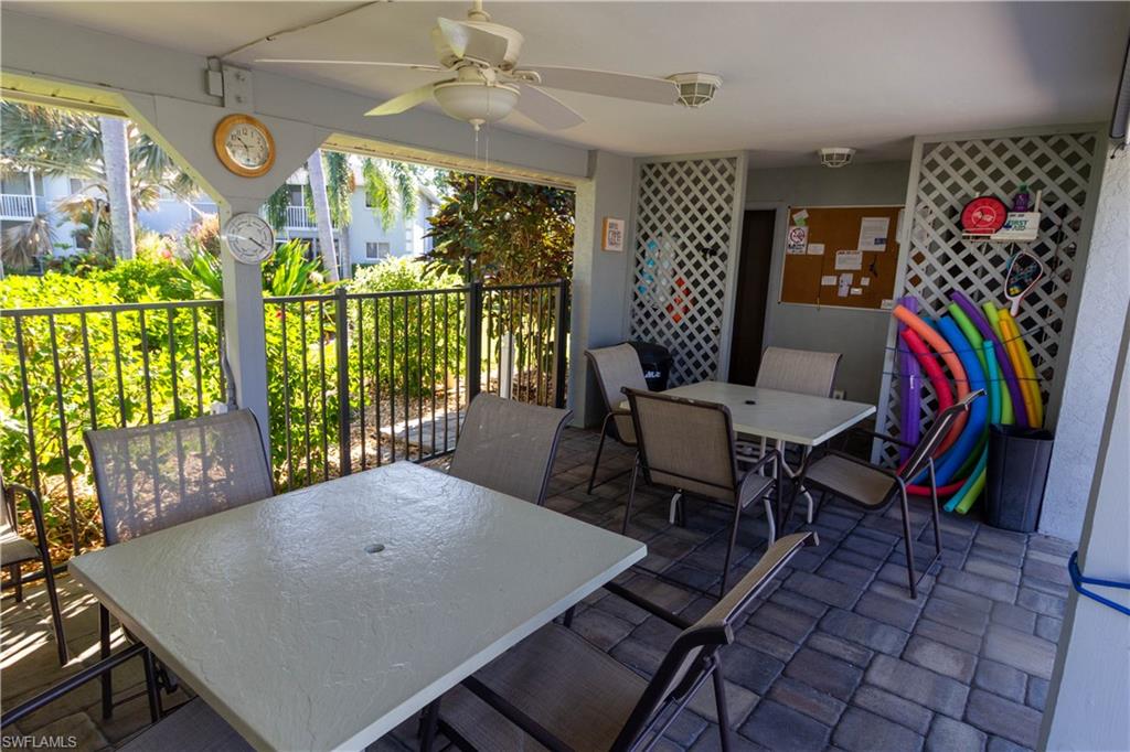 View of patio / terrace featuring outdoor dining space and a ceiling fan