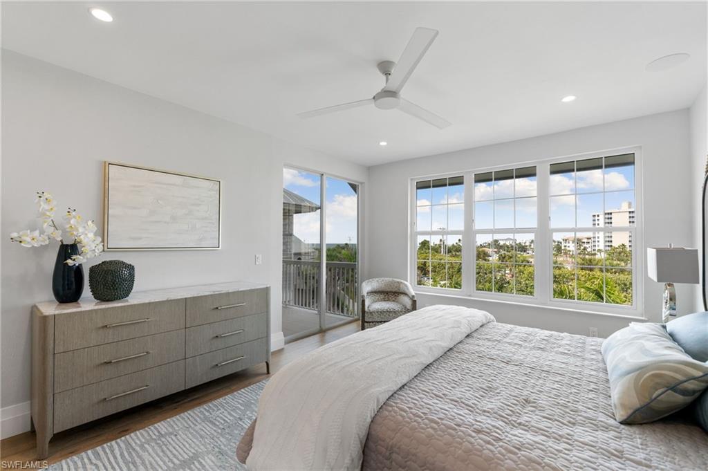 Bedroom featuring access to outside, a ceiling fan, recessed lighting, and light wood-type flooring