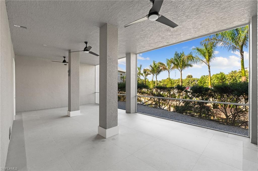 View of patio featuring ceiling fan