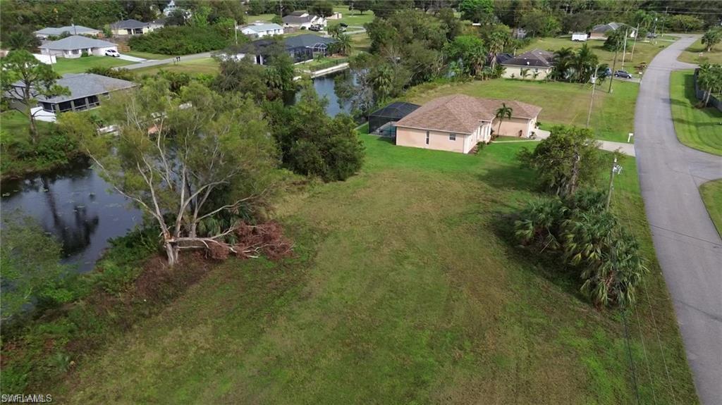 Aerial overview of property's location featuring a large body of water