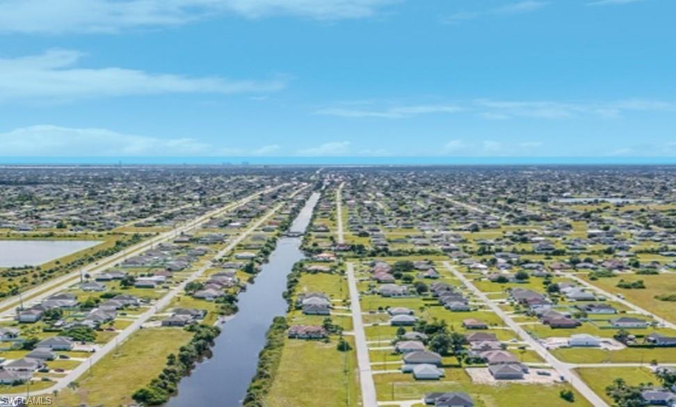 Aerial view of residential area with a large body of water