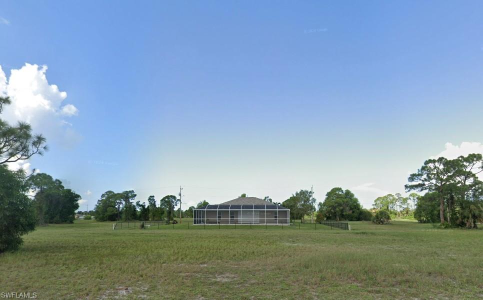 View of yard featuring a view of rural / pastoral area