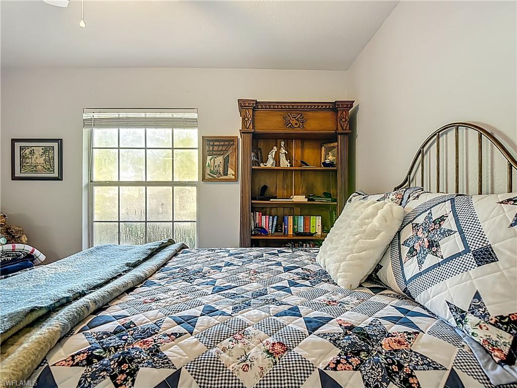 Bedroom featuring a ceiling fan
