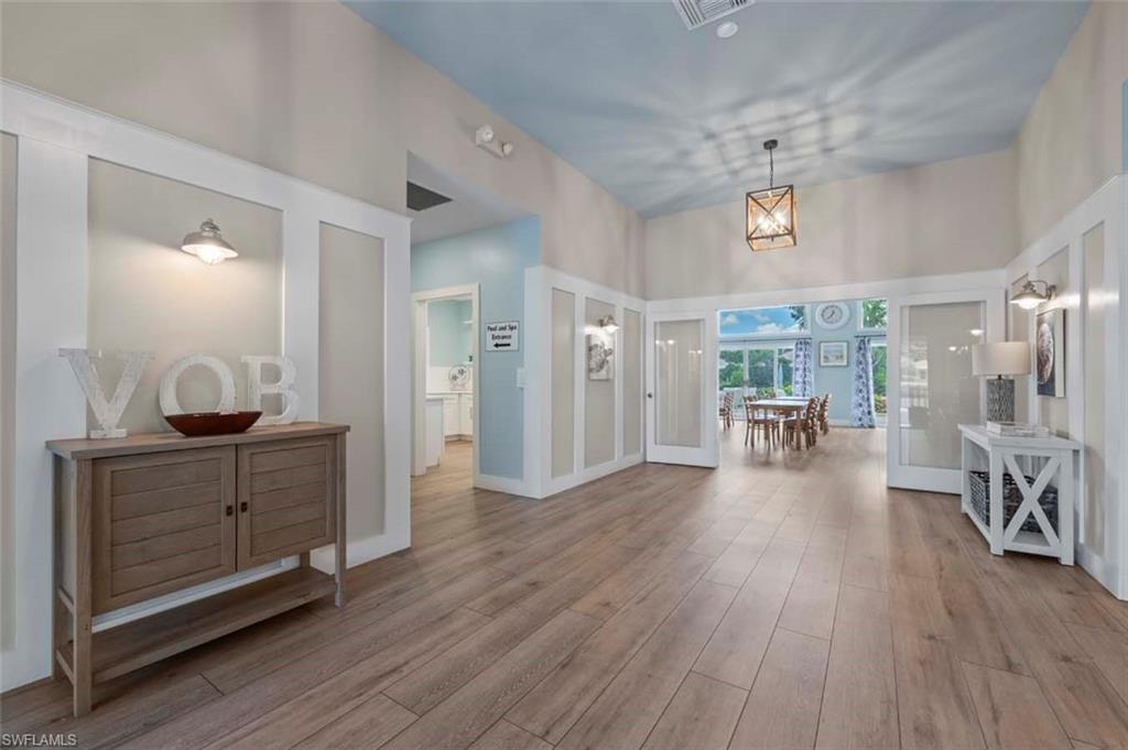 Entrance foyer with light wood finished floors