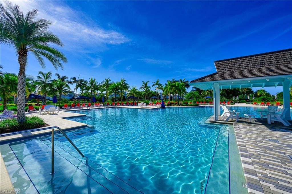 Community pool with a patio area