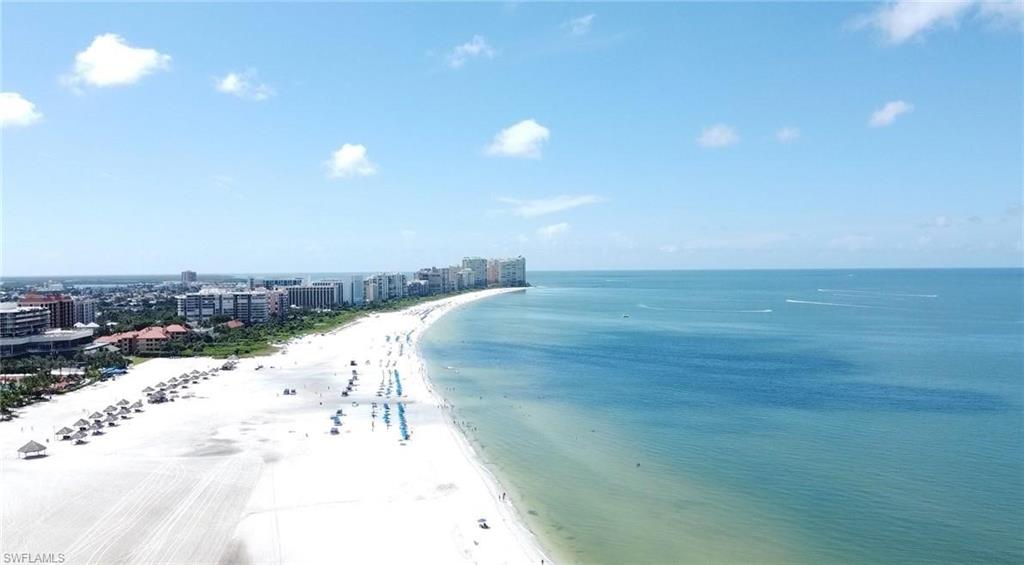 Water view with local beach and nearby urban area