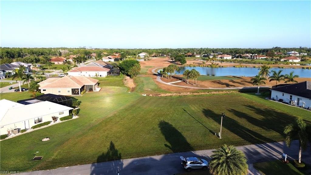 Aerial view of residential area with a nearby body of water