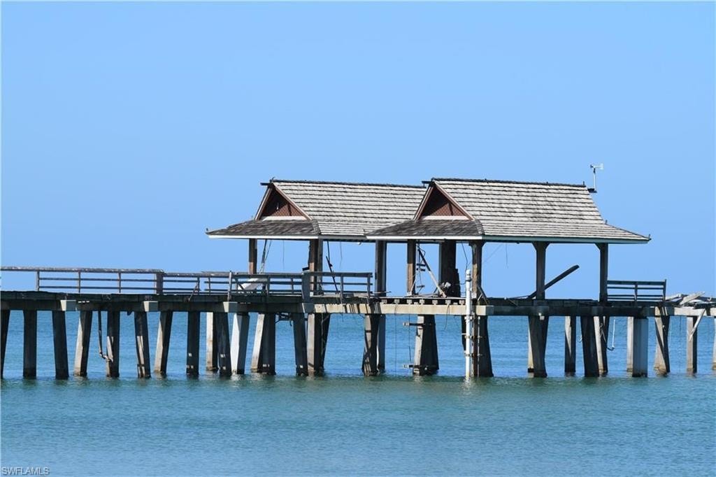 Dock with a water view and a pier