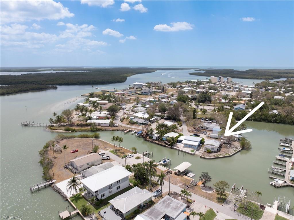View of property location with a nearby body of water