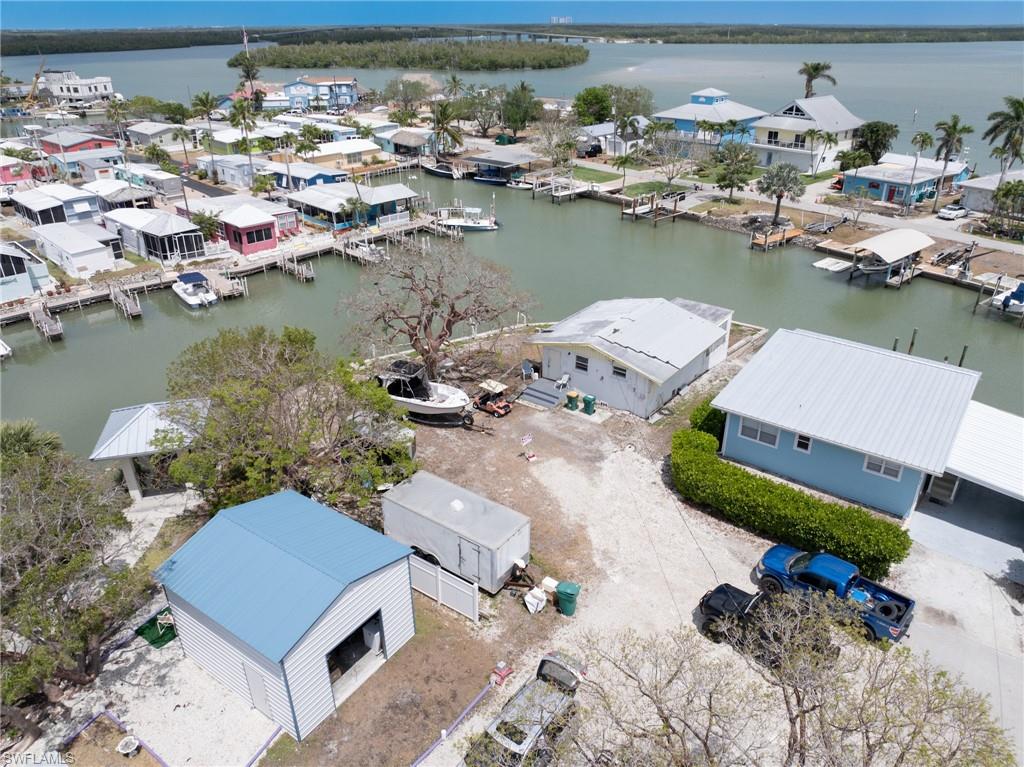 Aerial view of residential area with a nearby body of water