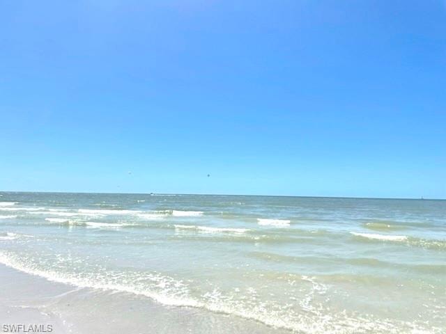 Tranquil lapping the sugar sand shores of the Gulf