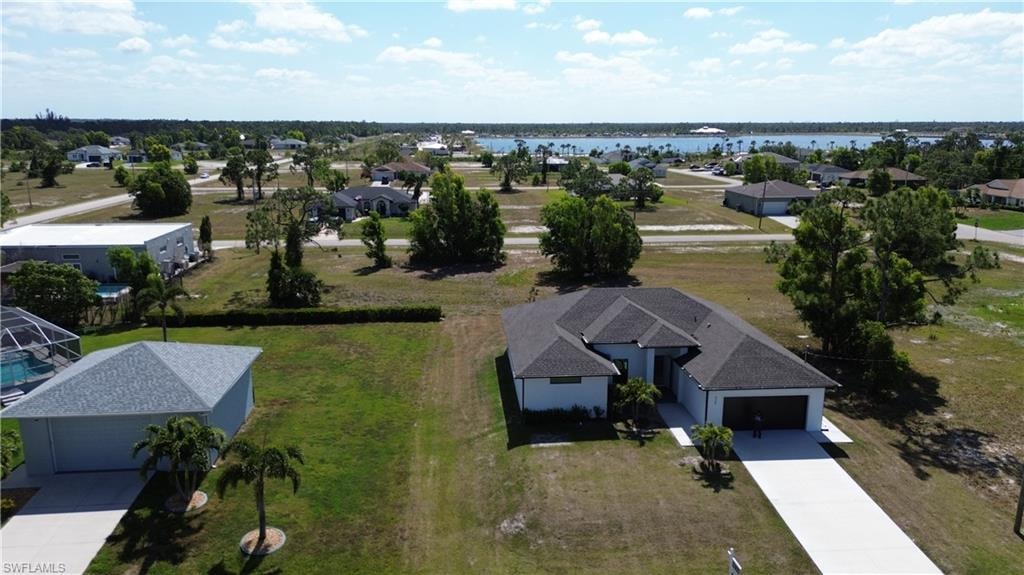 View of subject property with a nearby body of water