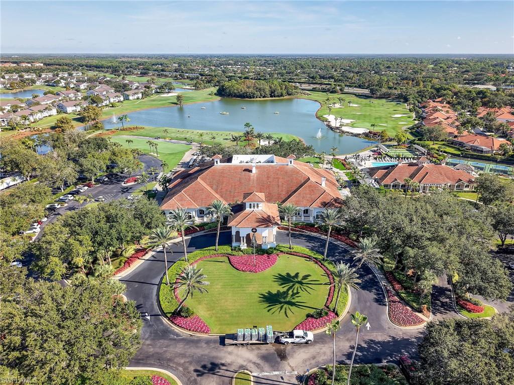 Cub, Aerial perspective of suburban area featuring a golf club and a nearby body of water