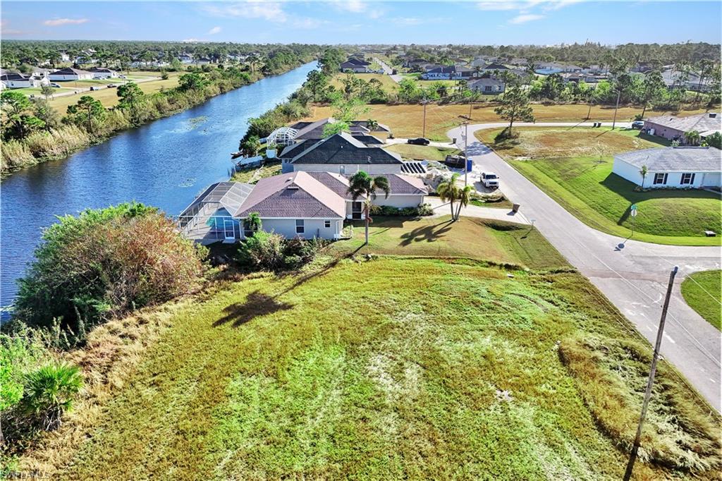 Aerial view of residential area with a large body of water
