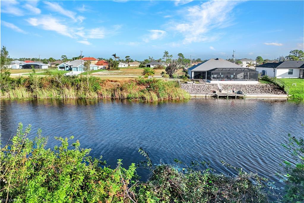 Water view with nearby suburban area