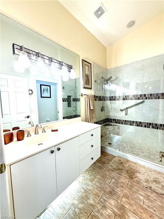 Guest bathroom has a renovated shower