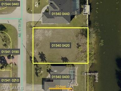 Aerial overview of property's location featuring property parcel outlined