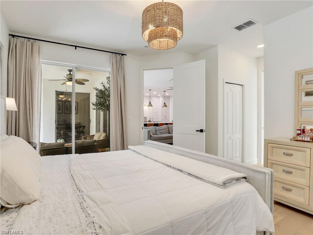 Bedroom featuring access to exterior and recessed lighting