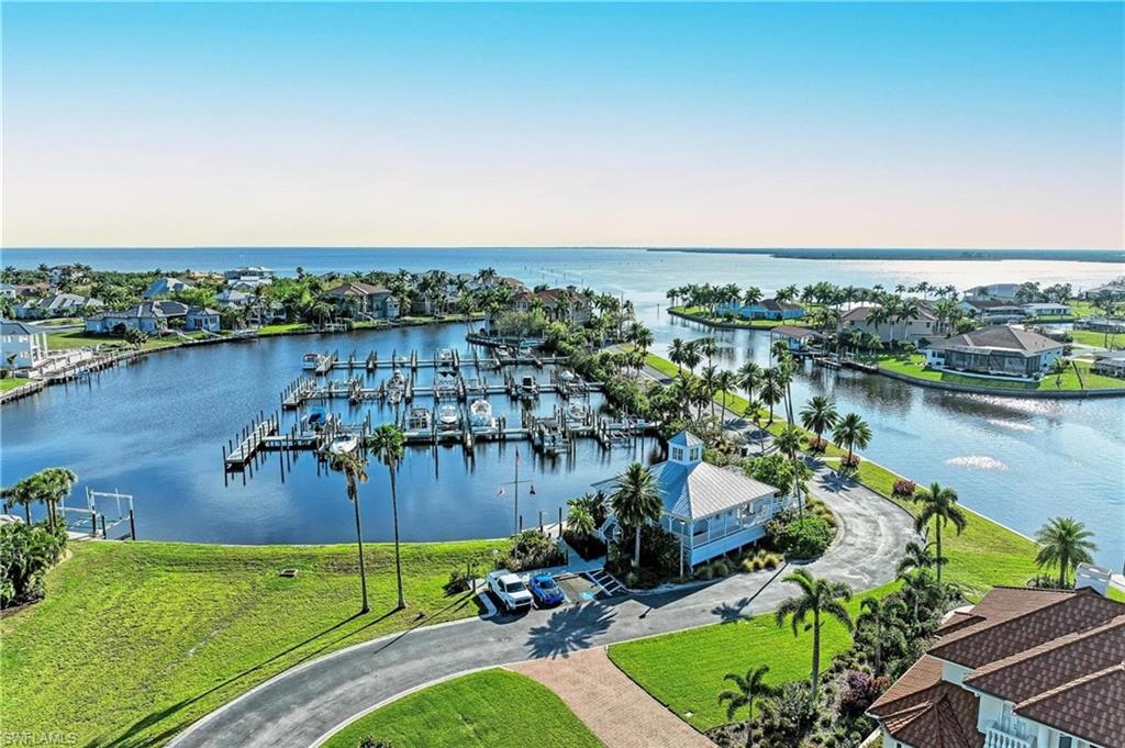 Aerial view of a nearby body of water and a marina