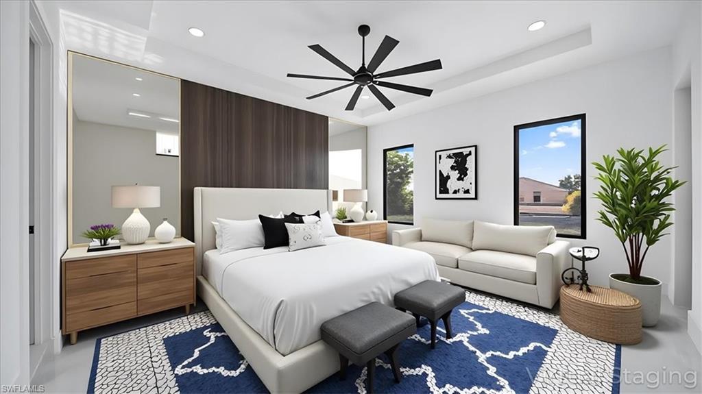 Bedroom with recessed lighting and ceiling fan