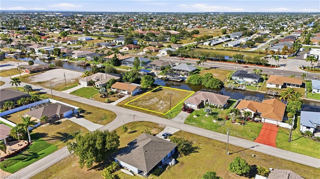 Aerial view of residential area with a large body of water
