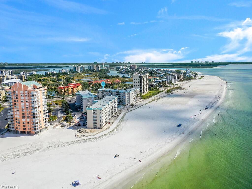 View of urban area with waterfront with a beach