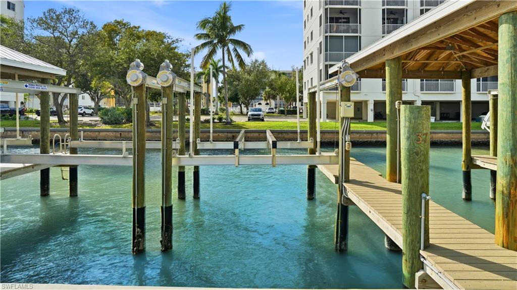 Boater's Dream with Luxury Condo Lifestyle. Includes your own boat dock/life with this unit, just steps to get there. Dock #37 on canal to get  Estero Bay within minutes- Virtually Edited Image