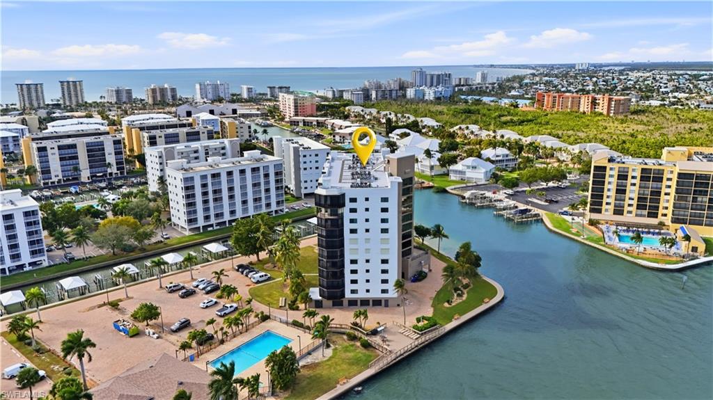 View Harbour Pointe and canal connected to Estero Bay, left pool is Harbour Pointe's pool - Virtually Edited Image