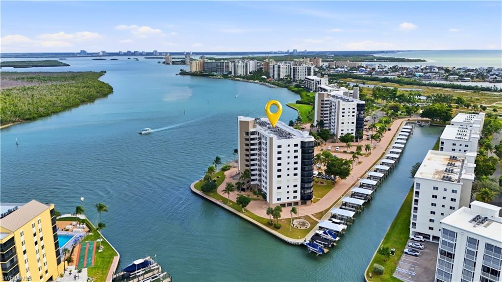 View of Harbour Pointe with canal and Boat Docks/Lifts and Estero Bay - Virtually Edited Image