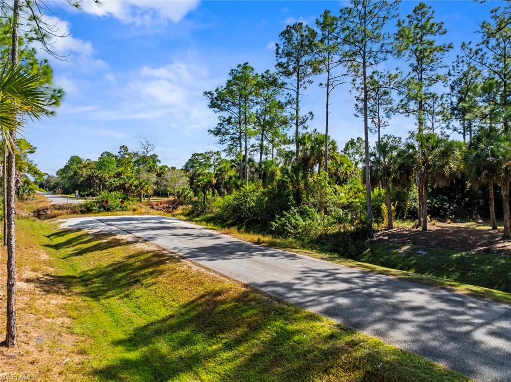 2.73 acre lot on the canal.  Just minutes away from soon to be opened Vanderbilt Beach Rd and several shopping centers.