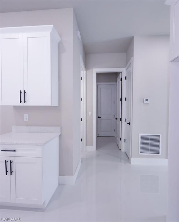 Hallway with baseboards