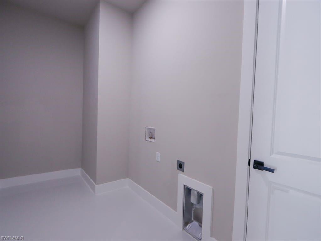 Laundry area with washer hookup and electric dryer hookup
