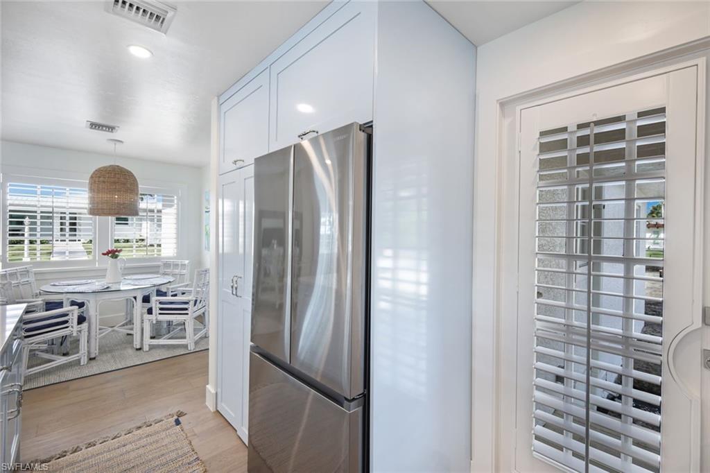 Kitchen with Back Door Leading to Deck